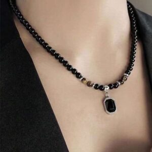 Tiger stone beaded necklace with black stone pendant