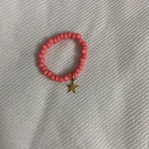 Red beaded dangling star ring